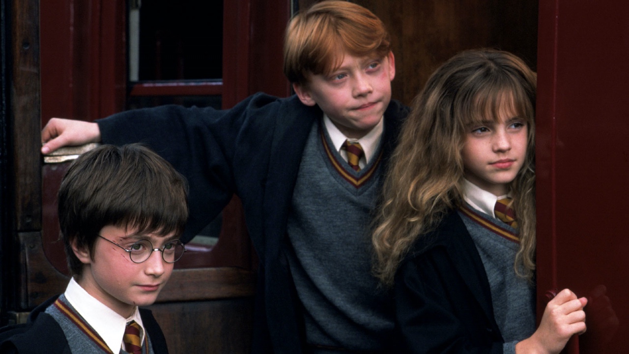 Daniel Radcliffe, Rupert Grint y Emma Watson como Harry Potter, Ron Weasley y Hermione Granger en La Piedra Filosofal
